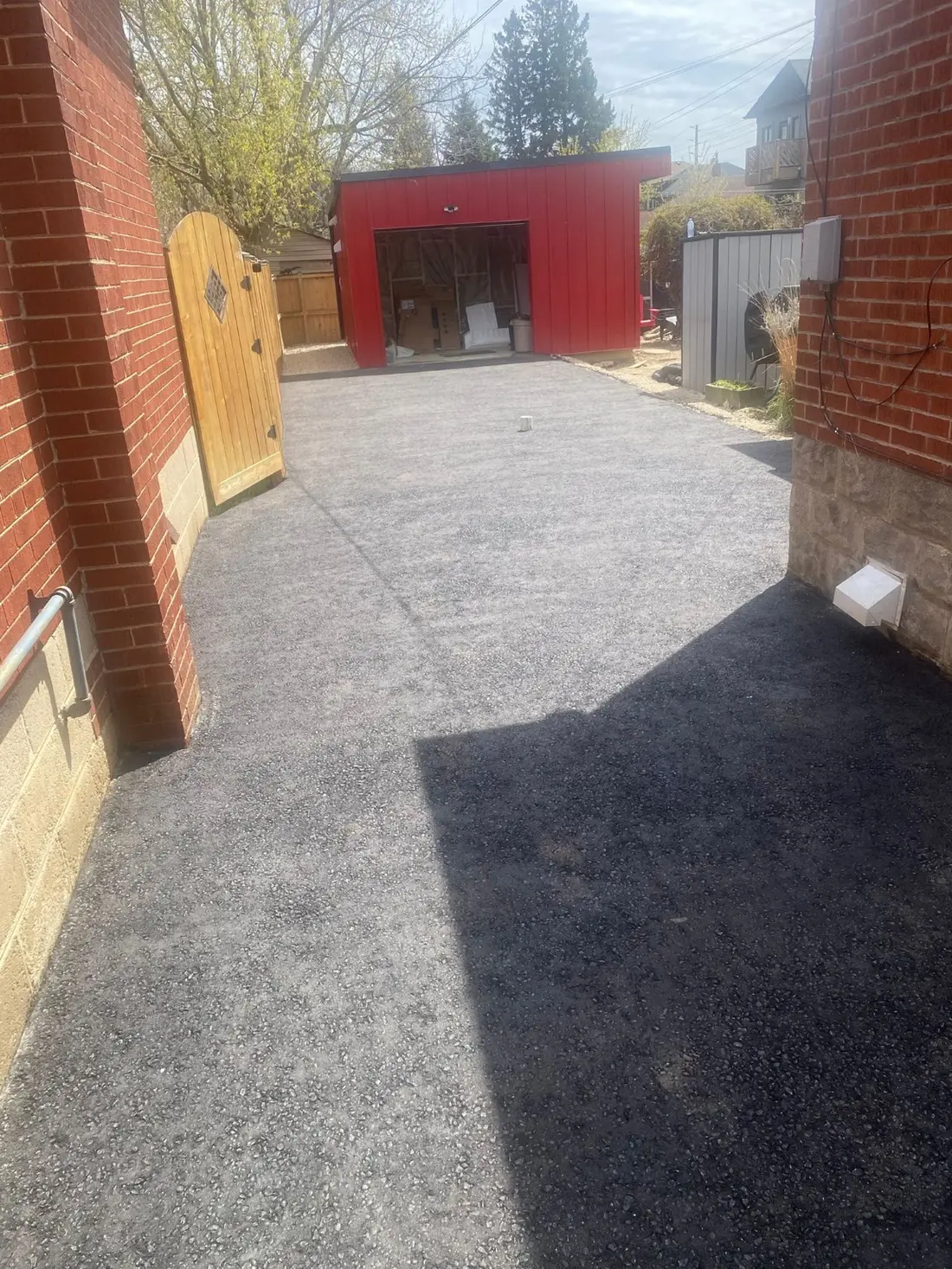 Fresh asphalt surface at a residential property